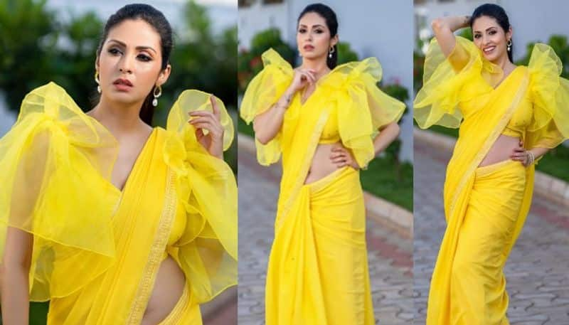 Actress Sada  looks beautiful in Yellow Saree  NSK