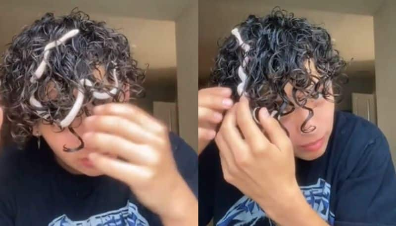 pet snake inside mans curls the video going viral hyp 