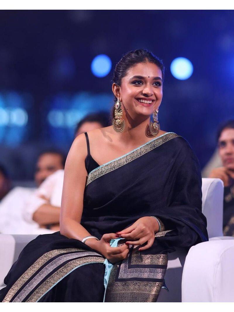 Keerthy Suresh flaunts black satin silk sari in maamannan audio launch vcs 