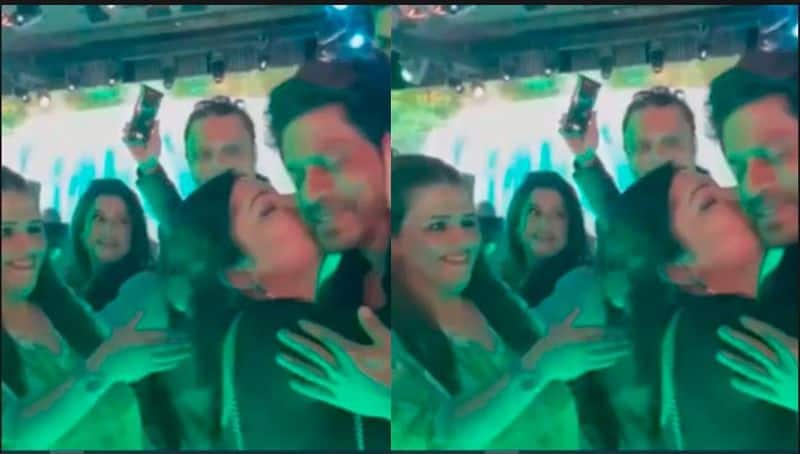 Lady fan who forcibly hugs and kisses Actor Shah rukh Khan Video goes viral netizens say she should be jailed akb