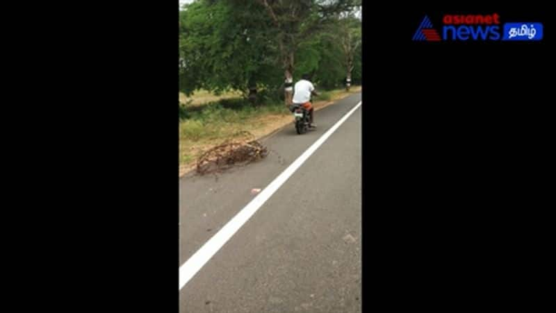 a person who dragged the wire fence on the highway to buy alcohol