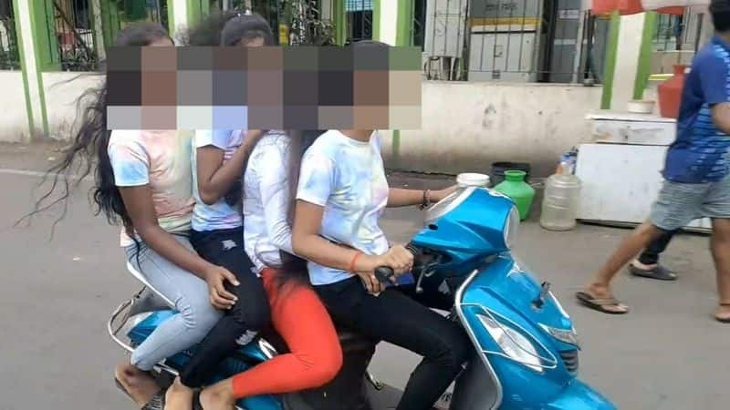 4 young women ride in single bike in chennai