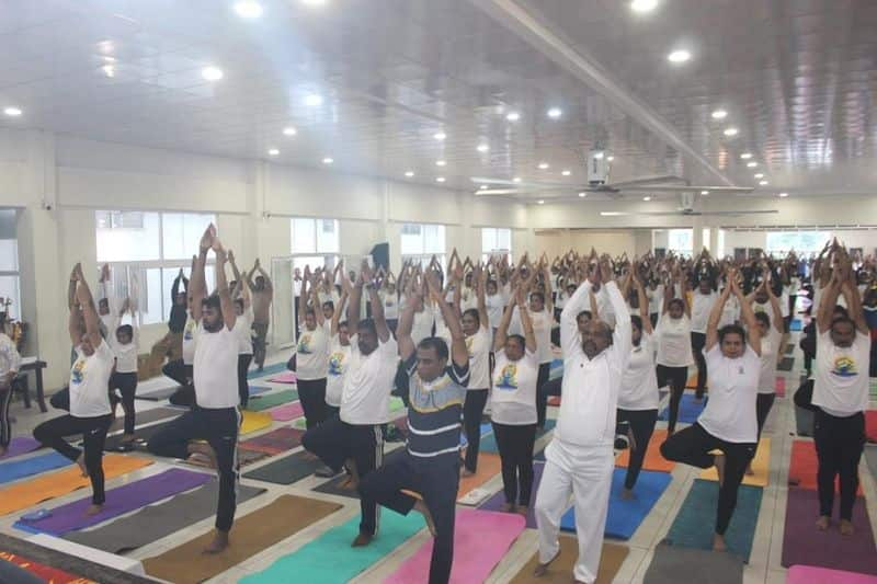 International Yoga Day Thousands of students practiced yoga in Kodagu gvd