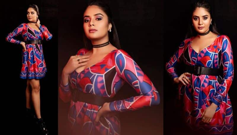 Anchor Sreemukhi Stunning Poses in mini gown NSK