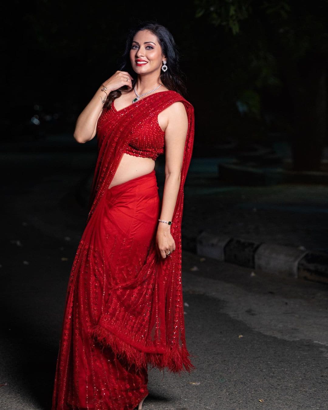 sadha ravishing poses in red saree her super gorgeous stills shake internet arj