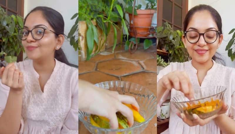 Ahaana krishna eating mango salt chilly azn 