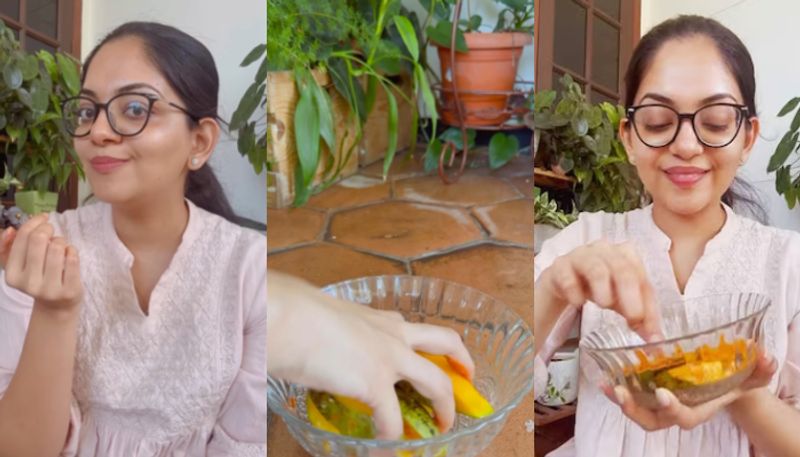 Ahaana krishna eating mango salt chilly azn 