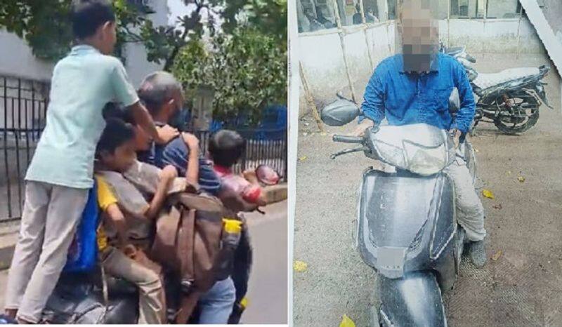 Man rides scooter with 7 children as a pillion passengers in Mumbai road video goes viral ckm