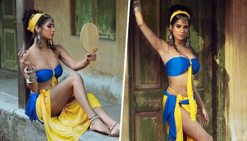 Poonam Pandey HOT Photos: Actress displays sexy body in strapless dark-blue tie-up bikini (PICTURES) vma