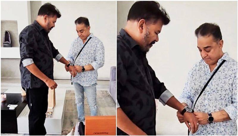 Kamal Haasan gifts watch to Indian 2 director Shankar sgk