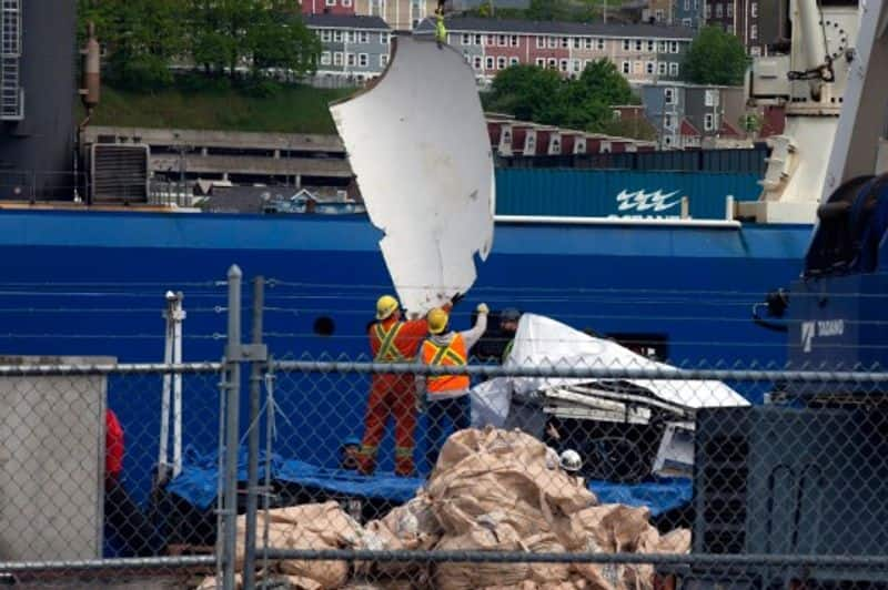 PHOTOS First look of imploded Titanic submersible as ship carrying debris docks in Canada snt