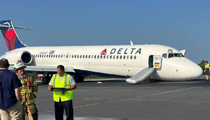 Dramatic Delta Boeing 717 with 96 passengers aboard lands 'smoothly' on its NOSE - WATCH snt