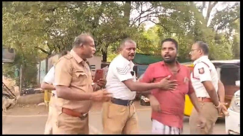 drunken man argument with police officers in dindigul district