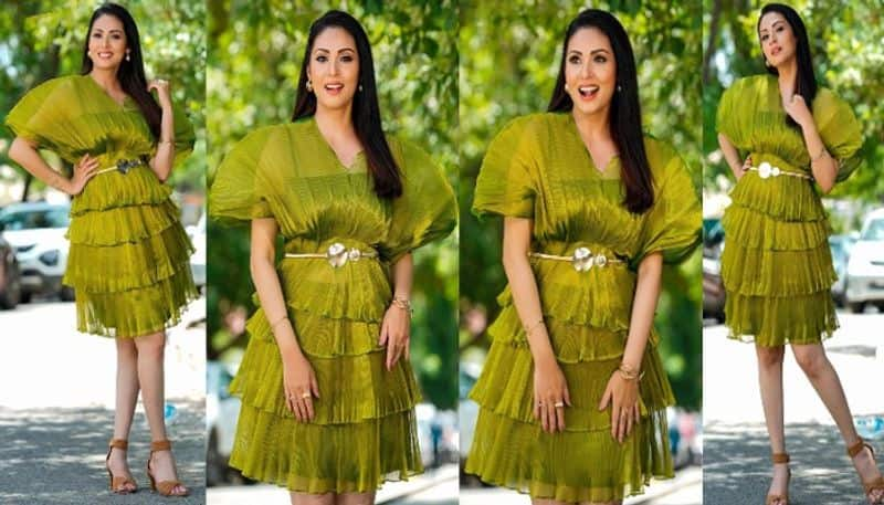 Actress Sadha Looks beautiful in green mini Gown NSK