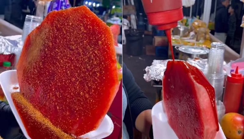 street food vendor makes sweet and sour watermelon dish hyp 