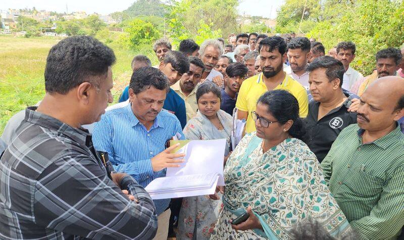 Nekkundi Lake chaos Minister Dr MC Sudhakar Anger against Fisheries Department officials gvd