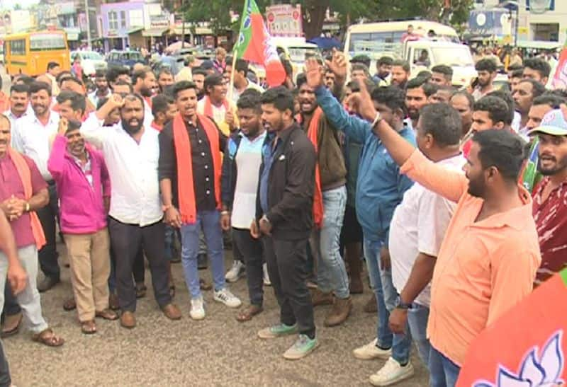 Yuvamorcha president Avinash accused of police assault Massive protest from BJP at Chikkamagaluru gvd