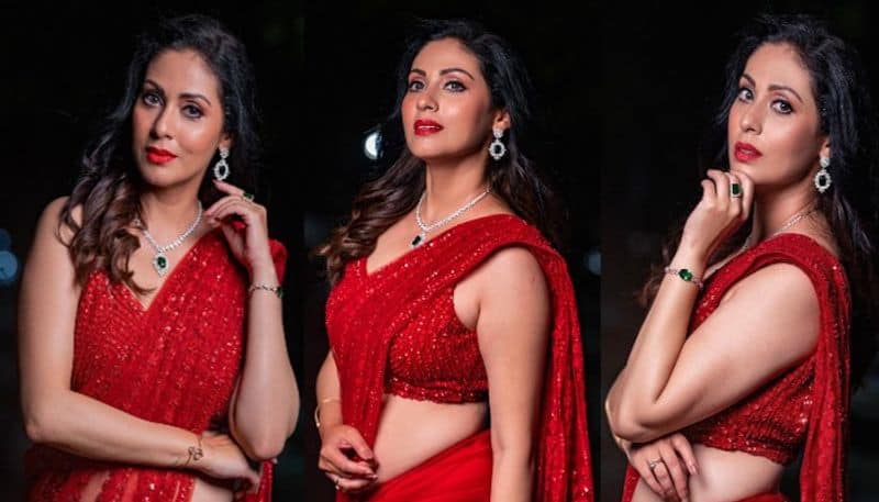 Actress Sadha looks beautiful in red saree NSK