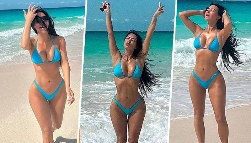 SEXY photos: Kim Kardashian flaunts her curves in blue bikini; star shares her beach vacay pictures  RBA