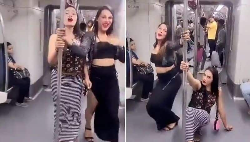 Viral Video: Two women 'pole dancing' inside Delhi Metro leaves internet fuming (WATCH) AJR