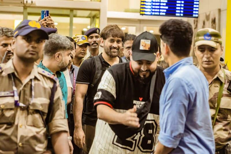 Fans erupts in cheers and showers flowers on MS Dhoni as he arrives in Chennai for LGM Trailer Launch kvn