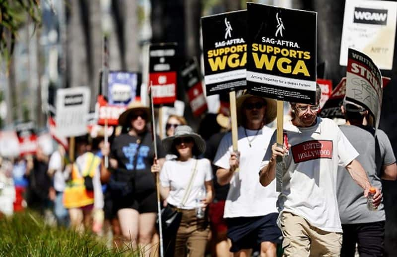 Hollywood Writers Protest biggest SAG strike in 60 years Jennifer Lawrence Brad Pitt stopped work san