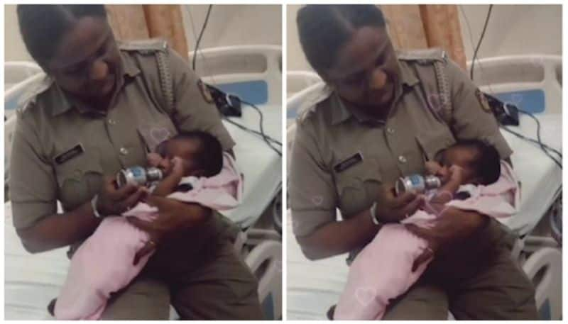 kerala police caring one month baby viral video -rse- 