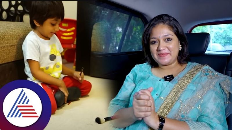 Meghana Raj shows simple makeup hack in car son Raayan Raj Sarja plays with brushes vcs 