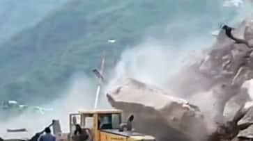 JCB drivers and others escaped in Himachal Pradesh as Big boulders fell down Viral video