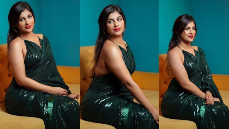 yashika Aanand looks dazzling in glittering green saree