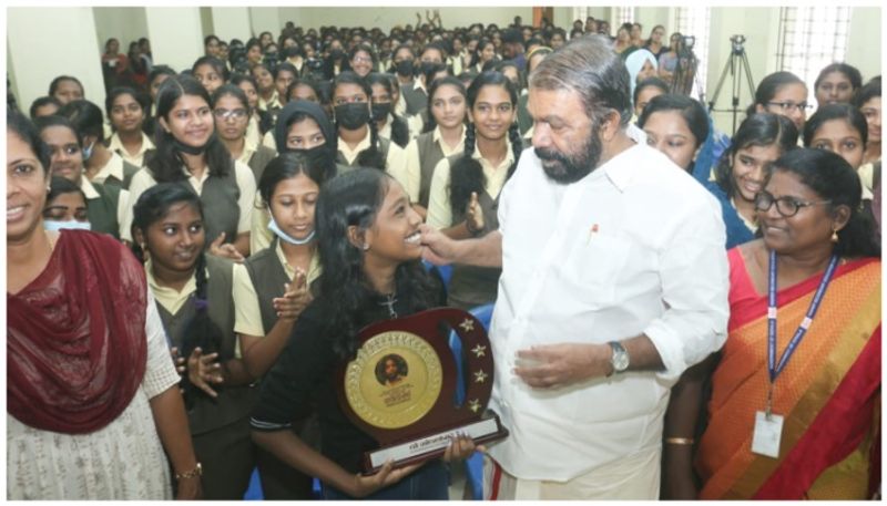 Minister v Sivankutty congratulate  best child actor Tanmaya at school sts