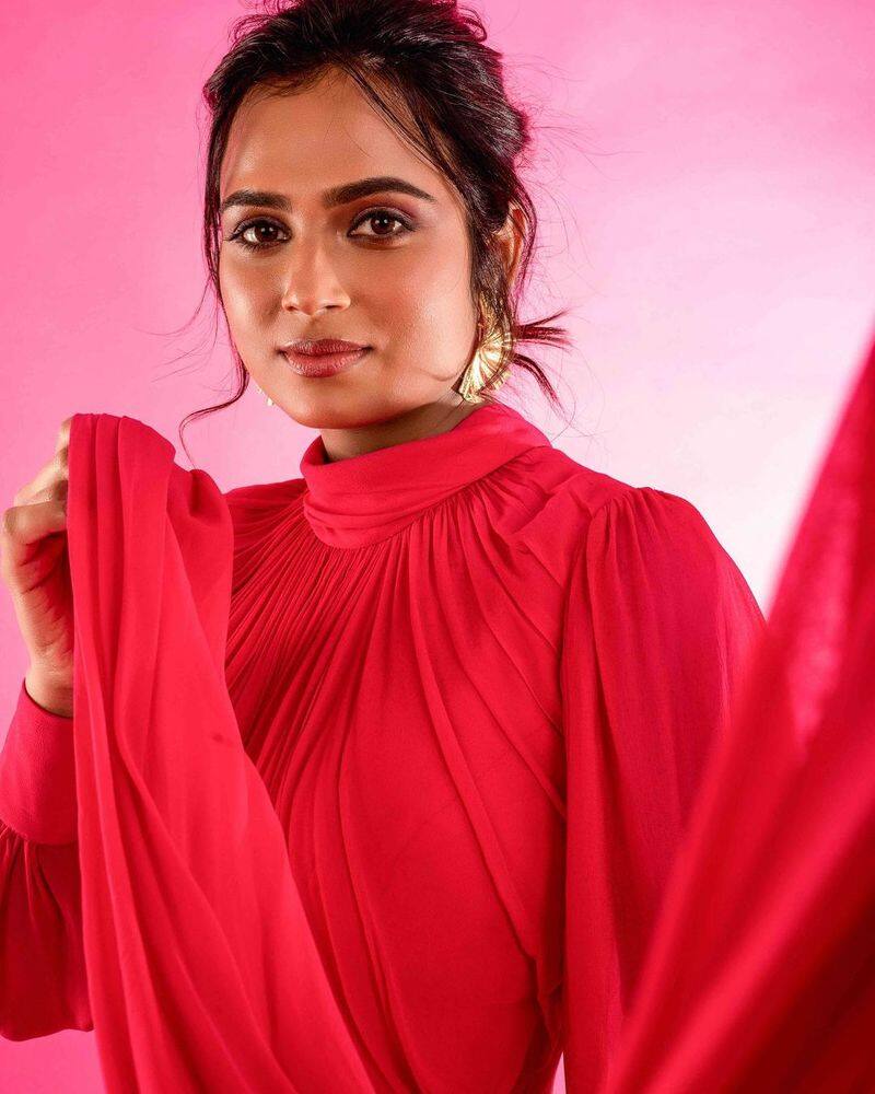 Ramya Pandian stunning photoshoot in cherry red dress