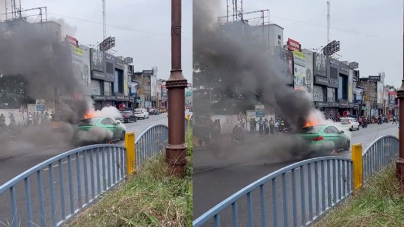 BMW car caught fire in the middle of the road in the middle of the rain at chennai video viral akb