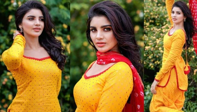 Jabardasth Varsha Looks beautiful in Yellow Chudidar NSK