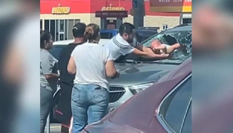 Dramatic rescue: Man smashes window to save baby from scorching hot car in Texas (WATCH) snt