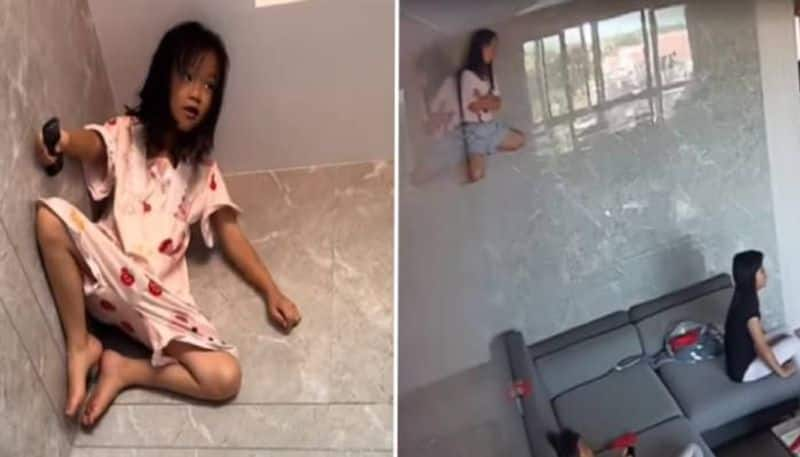 eight year old girl watching tv from Ceiling rlp