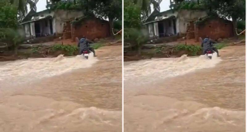  Man washed away along with bike Kannaram River Warangal AKP