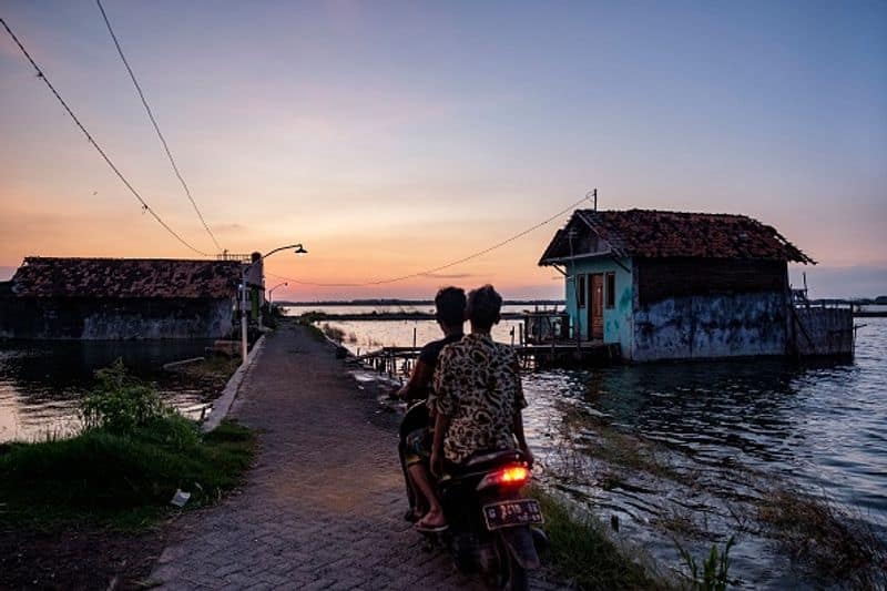 coastline that is momentarily submerged is Tambakrejo in Indonesia bkg