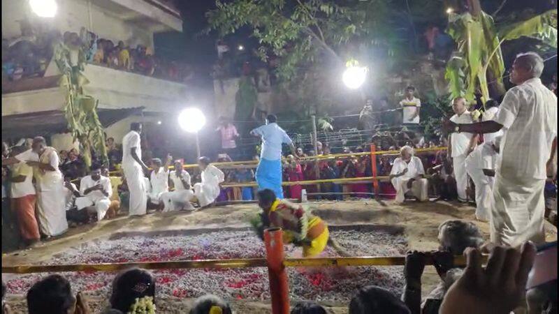 man carrying 1 year old daughter falls during fire walk ritual in thiruvallur