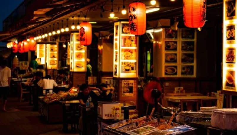 male servers dressed provocatively feeding woman mouth to mouth forced to shut down Chinese restaurant rlp 