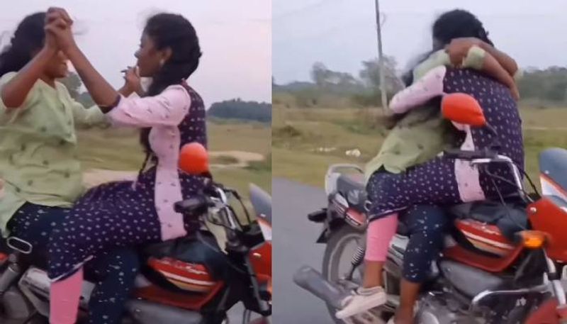 girls kissing on moving bike rlp