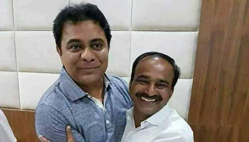 Telangana Minister KTR Hugs Etela Rajender affectionately in Telangana Assembly lns