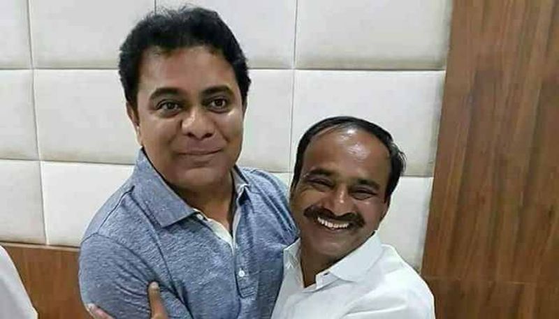 Telangana Minister KTR Hugs Etela Rajender affectionately in Telangana Assembly lns