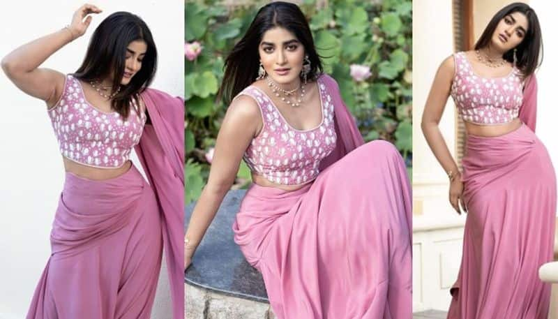 Dimple Hayathi looks beautiful in pink chudidar NSK