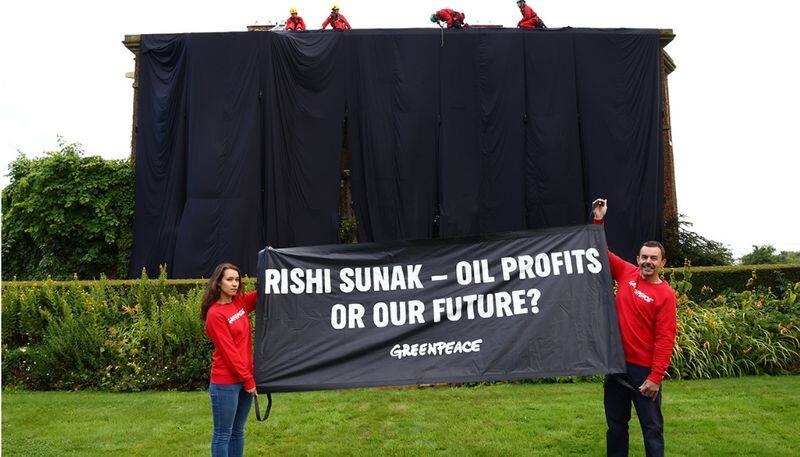 WATCH UK PM Rishi Sunak's home cloaked in black by environmental activists snt