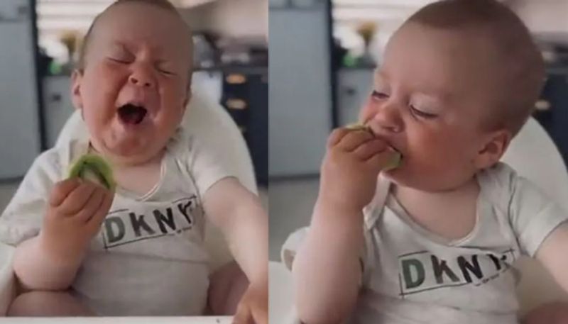 Viral video of Baby trying Kiwi for the First Time azn 