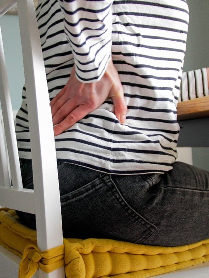 Poor posture while sitting, standing, or using electronic devices
