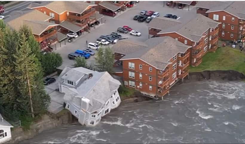Cascade of destruction: Two storey house collapses into Alaska river amid record glacial flooding   WATCH