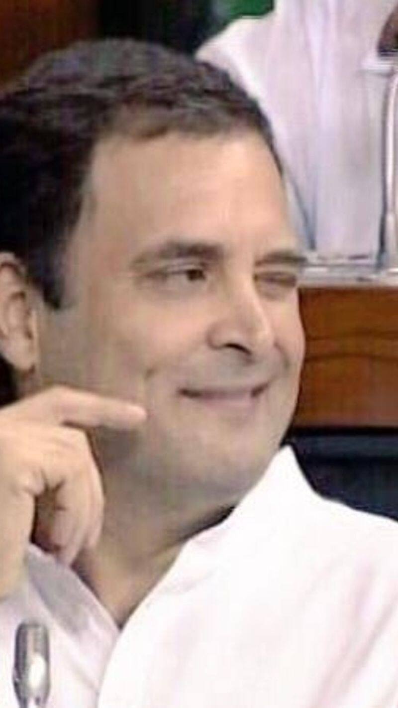 rahul gandhi flying kiss video modi hug eye wink trending no confidence motion kxa 