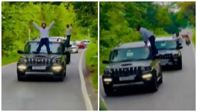 two men dancing on the bonnets of moving cars in a highway police impose fine of one lakh rupees afe